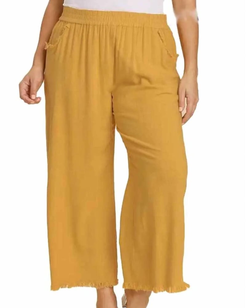 Front of a model wearing a size 1X Wide Leg Linen Pant With Fringe - Plus In Honey in Honey by Umgee. | dia_product_style_image_id:360874